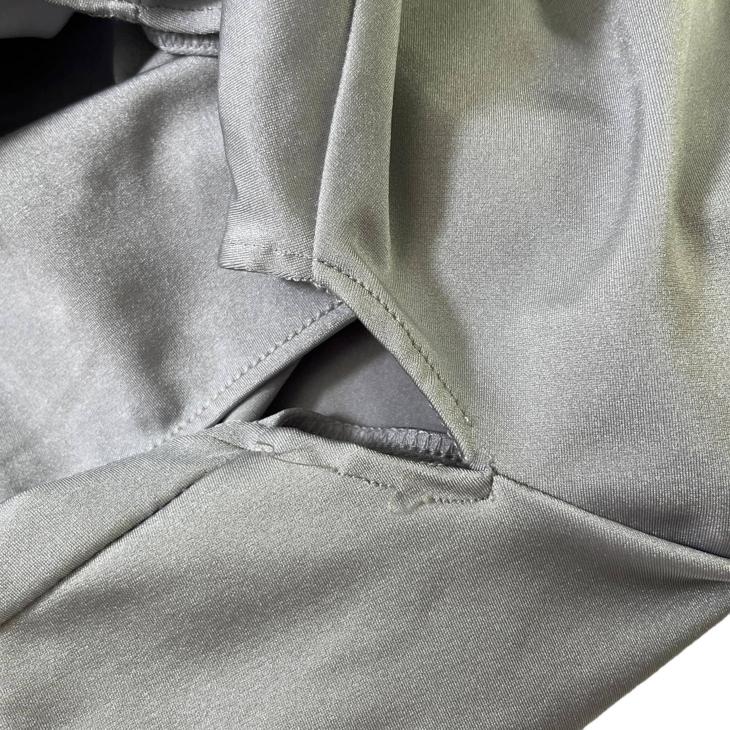 Coperni Twisted Cut Out Jersey Bodysuit in Pearl Grey