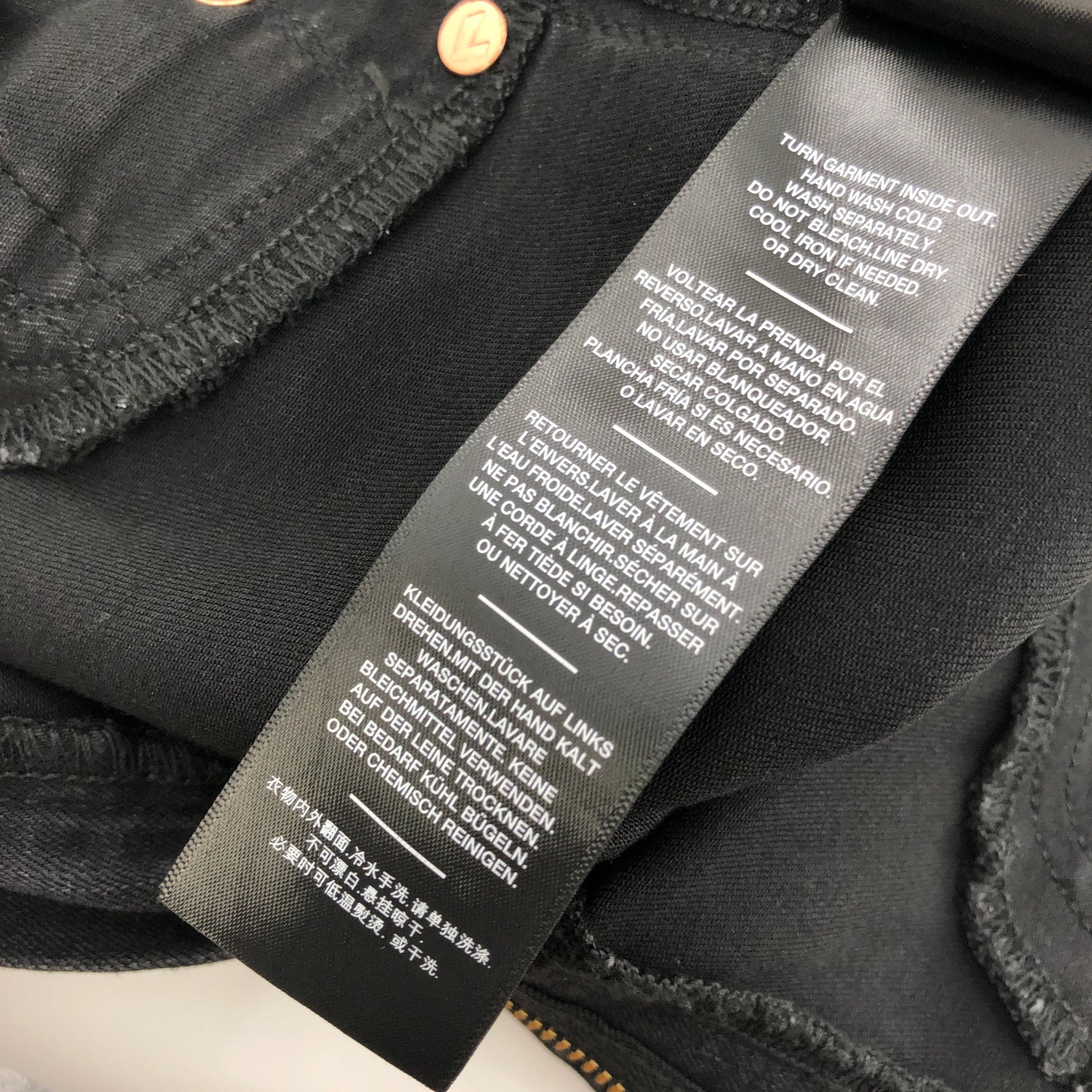 7 For All Mankind The High Waist Ankle Skinny With Faux Pockets in Black Coated